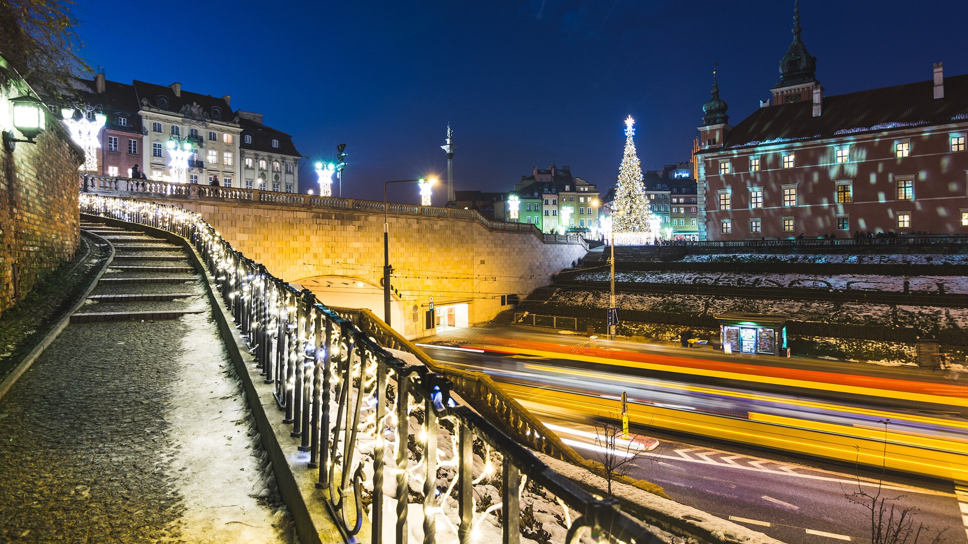 Christmas decorations lighting up a Warsaw street