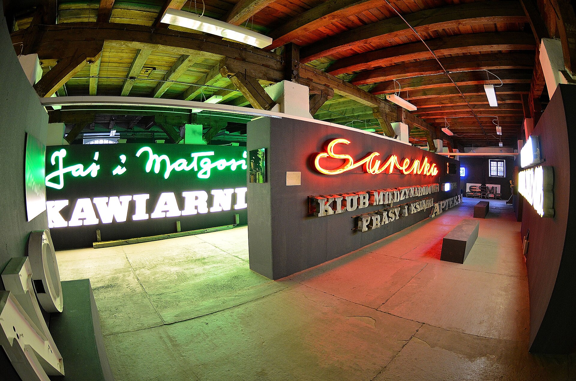 Glowing vintage neon signs inside the Neon Museum in Warsaw