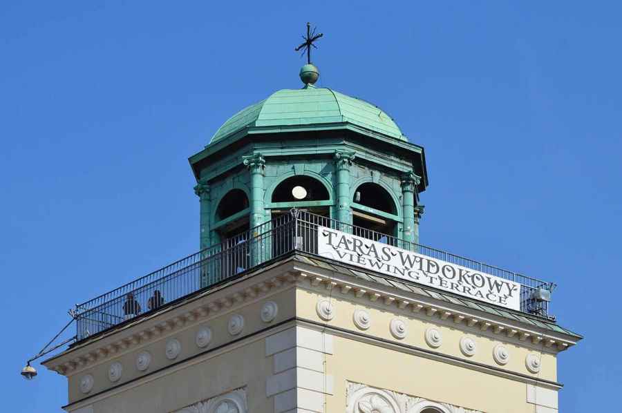 The bell tower of St Anne's Church in Warsaw with the viewing terrace banner