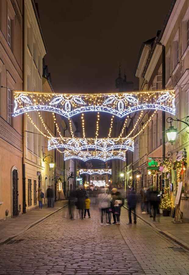 Christmas lights over a street in Warsaw's Old Town
